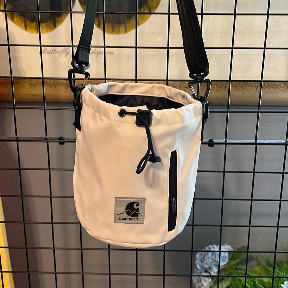 - Carhartt bucket bag crossbody. Off white New Great to use as camera bag
